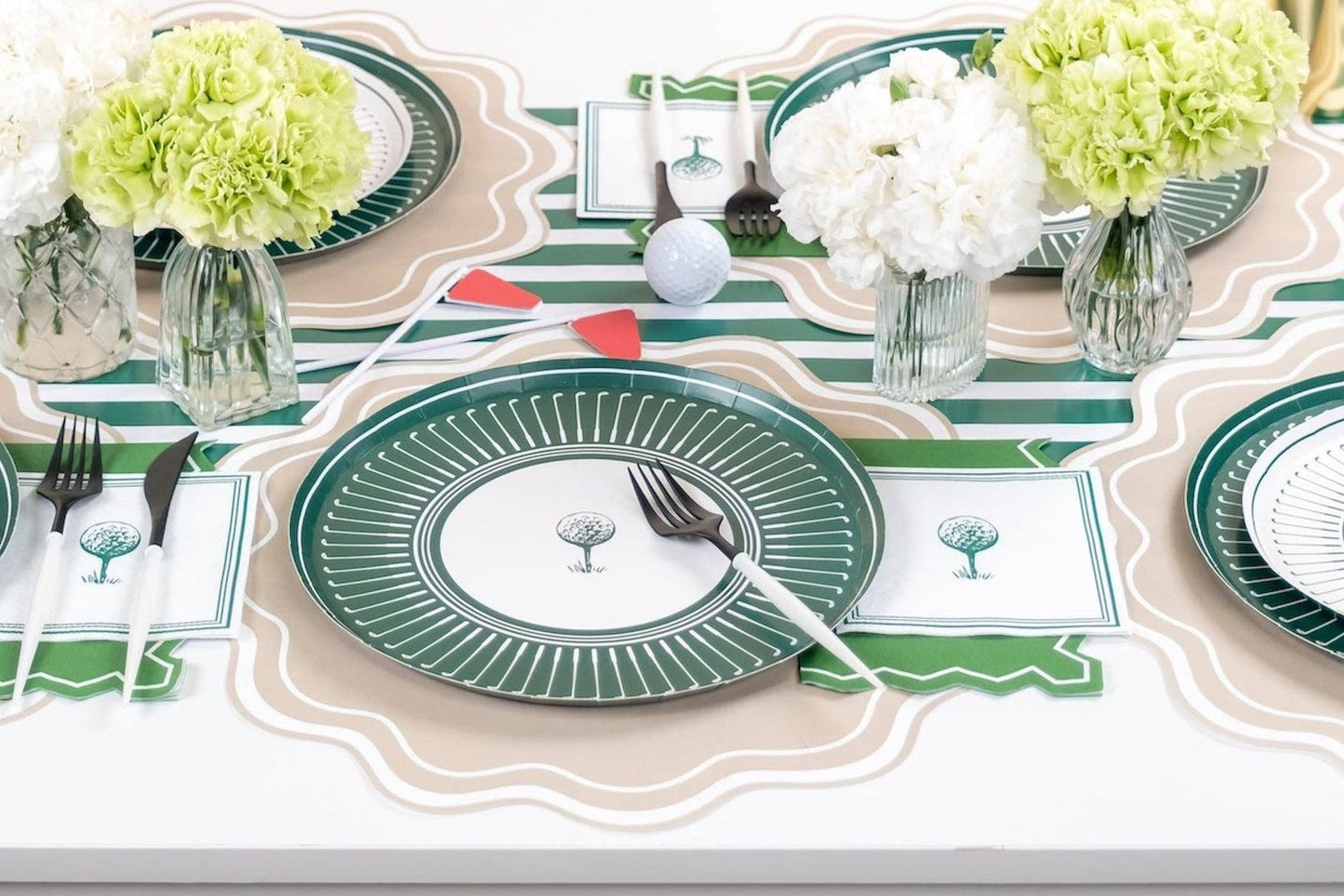 Set of 16 Gatherings by Curated Paperie golf-themed beverage napkins with printed golf ball and flag design.