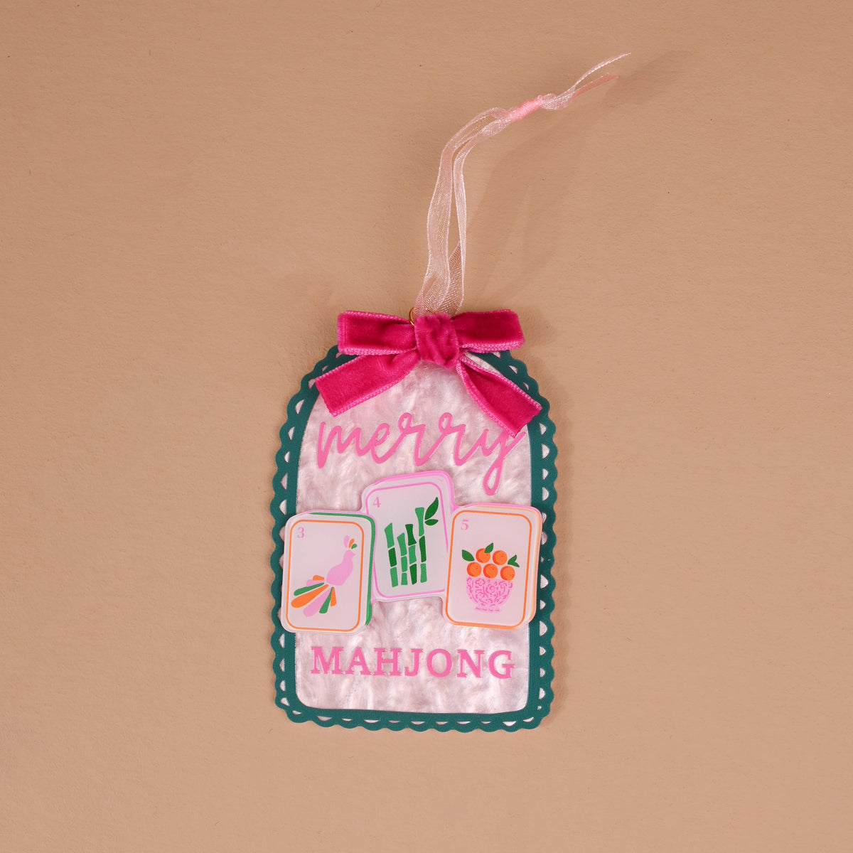 Acrylic ornament featuring a Merry Mahjong design from The Darling Effect, with colorful festive Mahjong tiles and holiday accents.