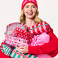 Shiraleah Holly Stripe Pink Cosmetic Pouch with zipper closure and fabric pattern, ideal for makeup and small accessories.