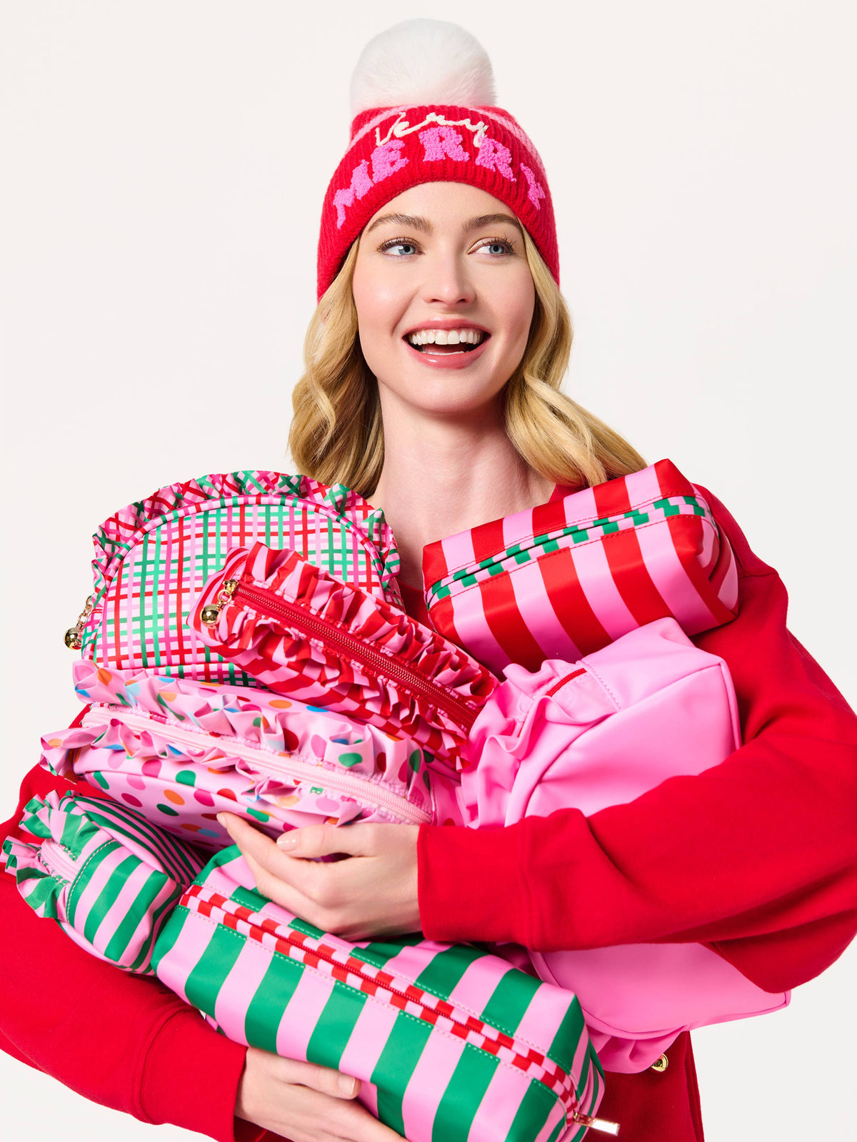 Shiraleah Holly Stripe Pink Cosmetic Pouch with zipper closure and fabric pattern, ideal for makeup and small accessories.