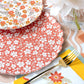 Autumn floral dinner plates by Gatherings by Curated Paperie, featuring colorful fall-inspired floral patterns on ceramic plates.