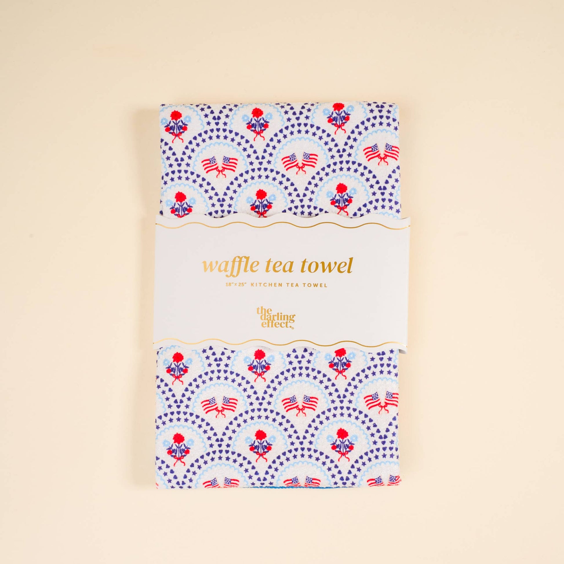 All-American Darling waffle tea towel by The Darling Effect featuring patriotic red, white, and blue star pattern.