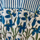 Set of 4 blue Pinwheel Napkins by Christina Dickson Home featuring a vibrant bluebird design for decorative table settings.