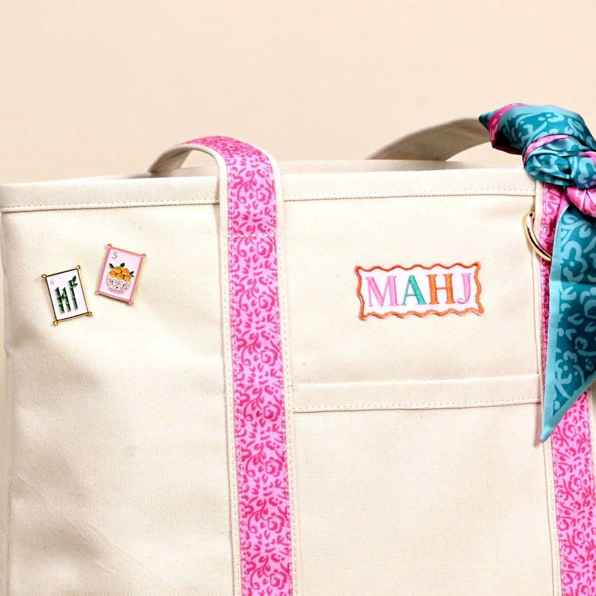 The Darling Canvas Tote Bag featuring "It's Mahj Time" design, made by The Darling Effect, with sturdy handles and spacious interior.