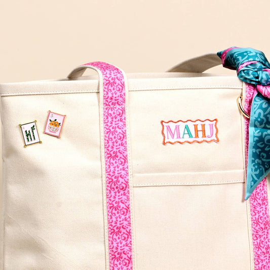 The Darling Canvas Tote Bag featuring "It's Mahj Time" design, made by The Darling Effect, with sturdy handles and spacious interior.