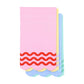 Colorful Ric Rac Rainbow Guest Napkins by Packed Party featuring vibrant rainbow zigzag patterns for celebrations.
