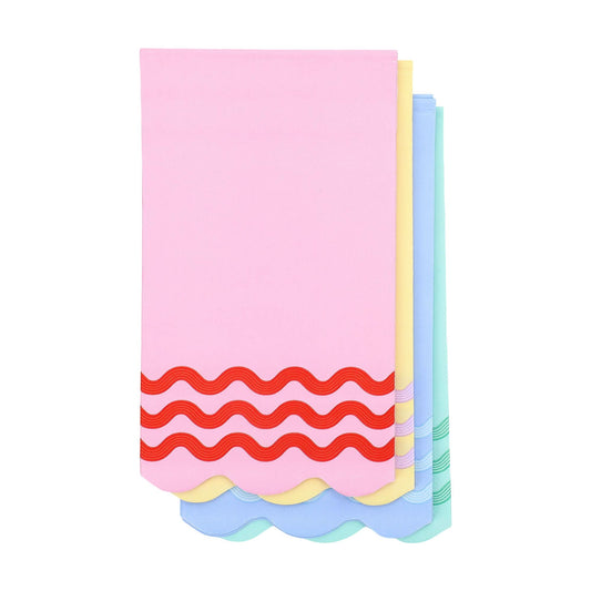 Colorful Ric Rac Rainbow Guest Napkins by Packed Party featuring vibrant rainbow zigzag patterns for celebrations.