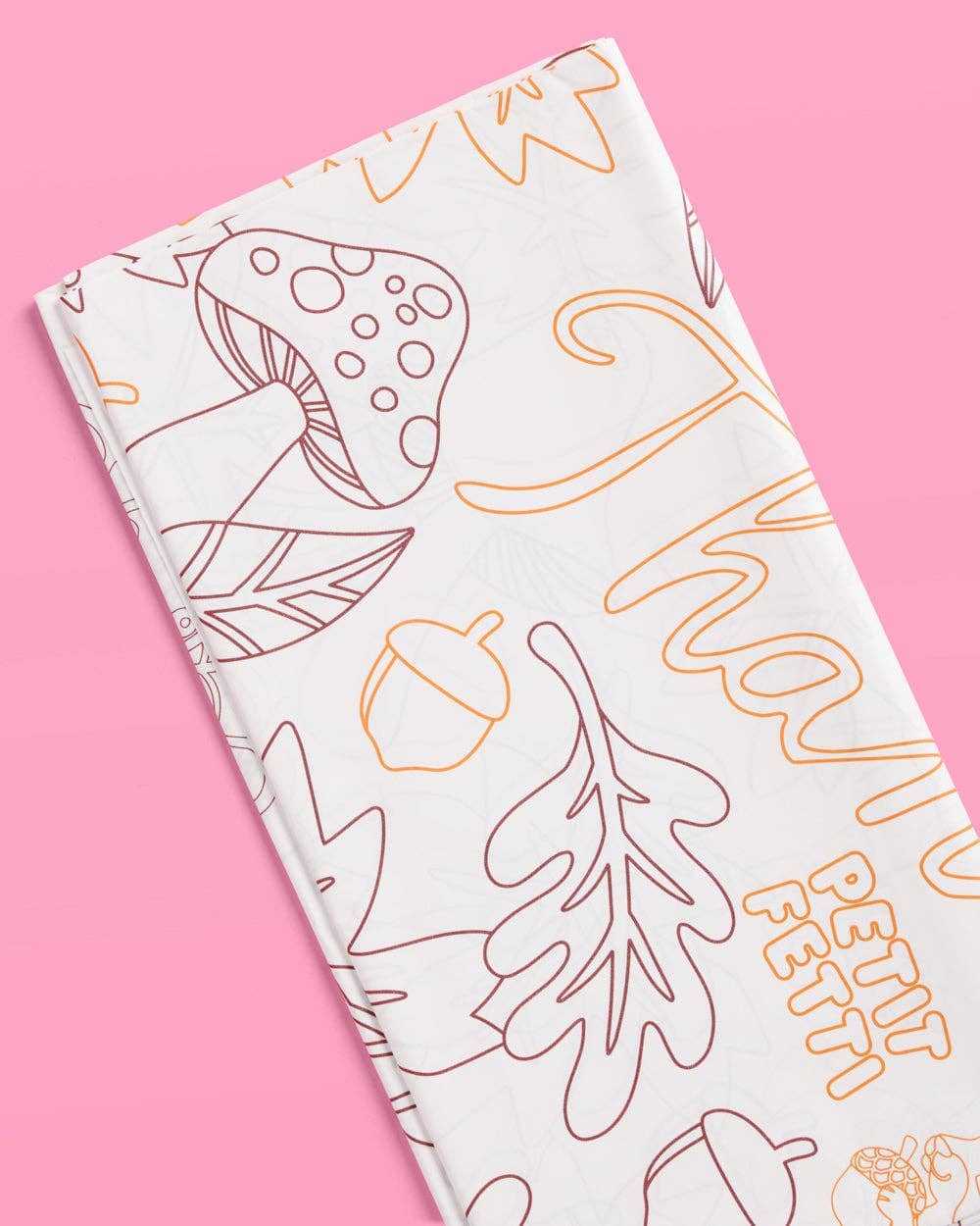 Give Thanks paper tablecloth by xo, Fetti featuring fall-themed autumn leaves and grateful message for festive table settings.