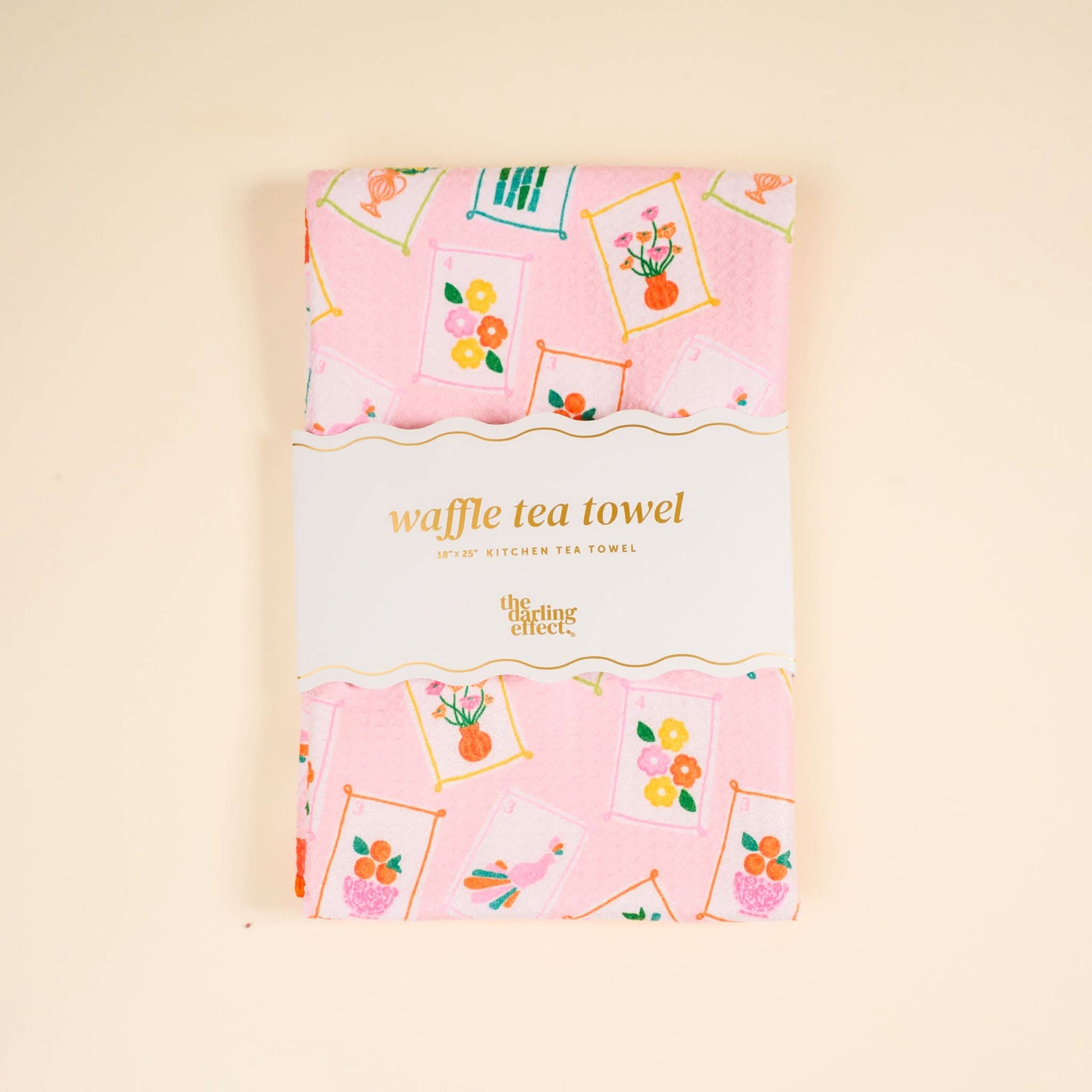 Waffle tea towel with "It's Mahj Time" text from The Darling Effect, featuring a soft, textured fabric in a cozy kitchen setting.