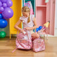 Pink Bows and Confetti Backpack by Packed Party featuring colorful bows, confetti accents, and a stylish backpack design.