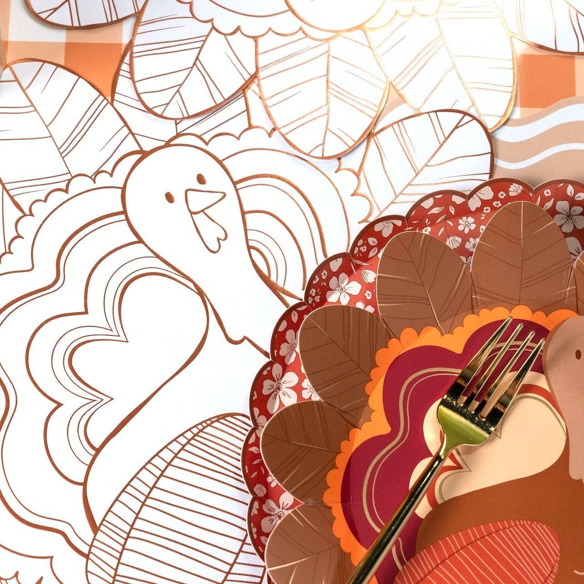 Thanksgiving turkey coloring placemats from Gatherings by Curated Paperie, featuring festive fall-themed designs for children.
