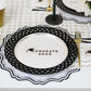 Black Basketweave Dinner Paper Plates by Gatherings by Curated Paperie featuring a woven basketweave design for elegant dining.