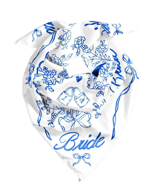White bridal hair scarf with delicate floral details from xo, Fetti, styled as a wedding accessory for elegant bridal looks.