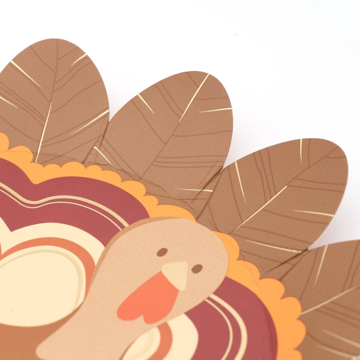 Thanksgiving turkey-shaped plates from Gatherings by Curated Paperie, featuring festive paper plates for holiday dining.