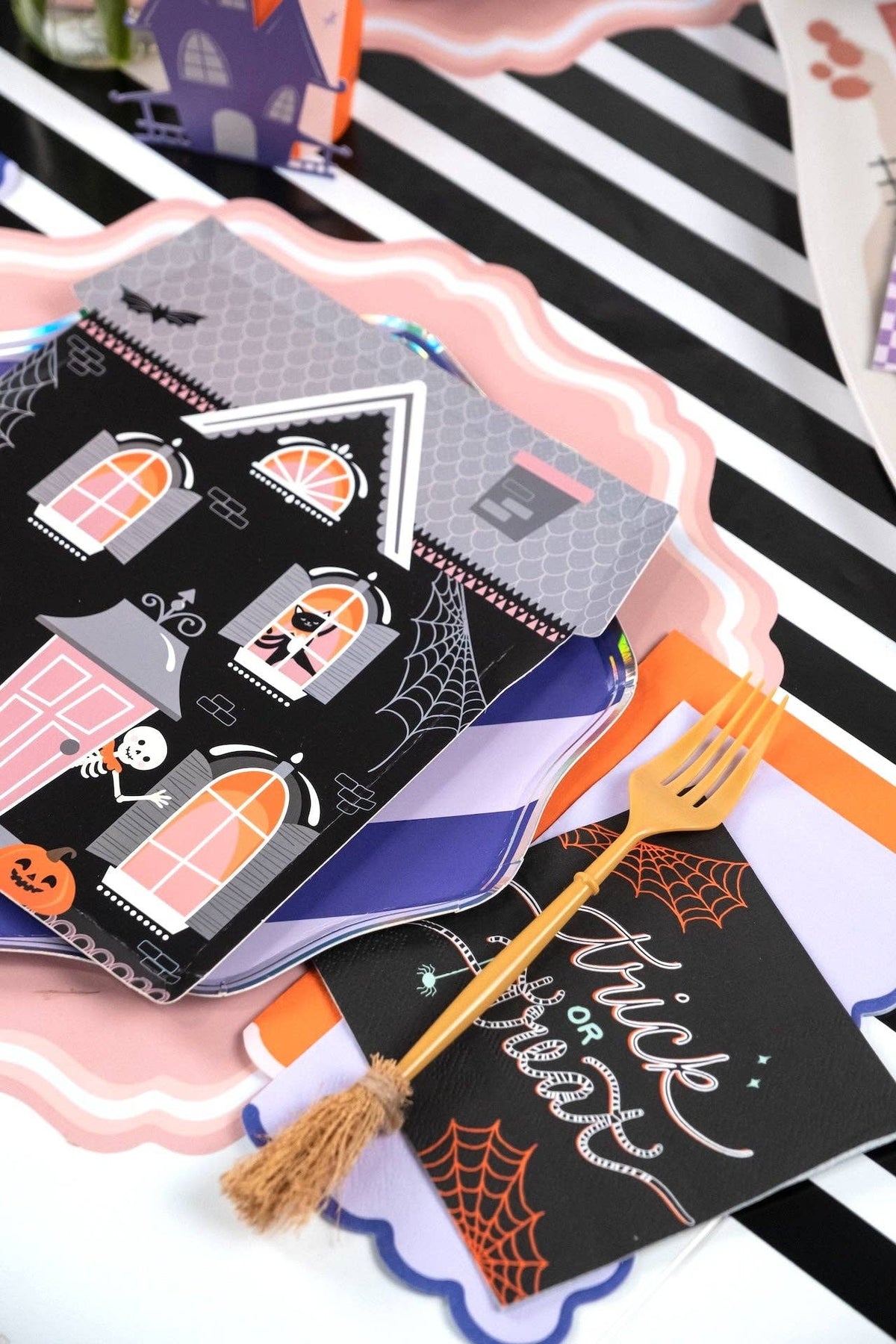 Set of Haunted House Halloween shaped paper plates featuring spooky haunted house designs for Halloween parties.