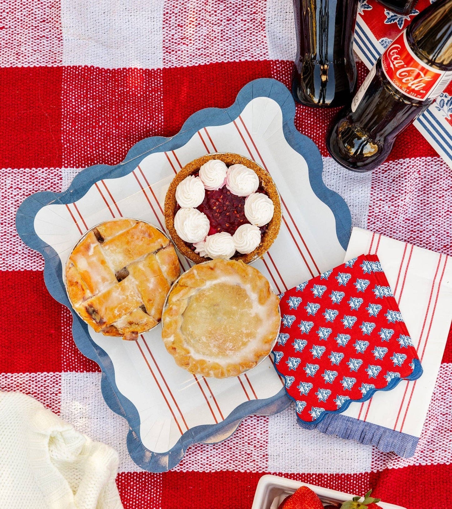 Red striped paper plate from My Mind’s Eye, 11-inch size, featuring a vibrant red and white striped design for celebrations.