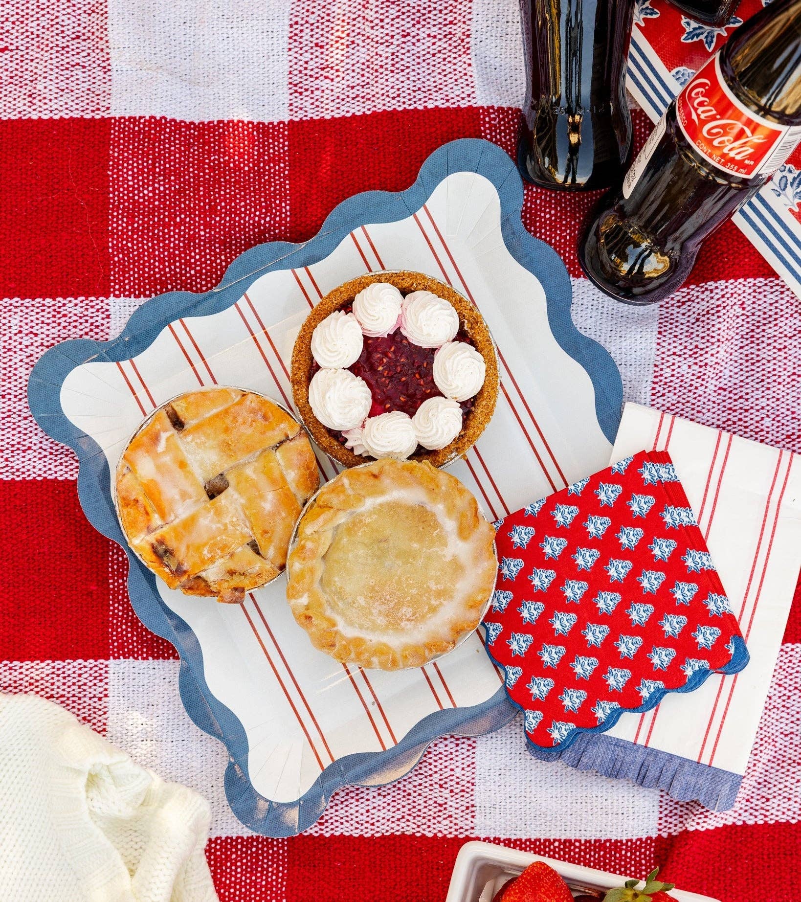 Red striped paper plate from My Mind’s Eye, 11-inch size, featuring a vibrant red and white striped design for celebrations.