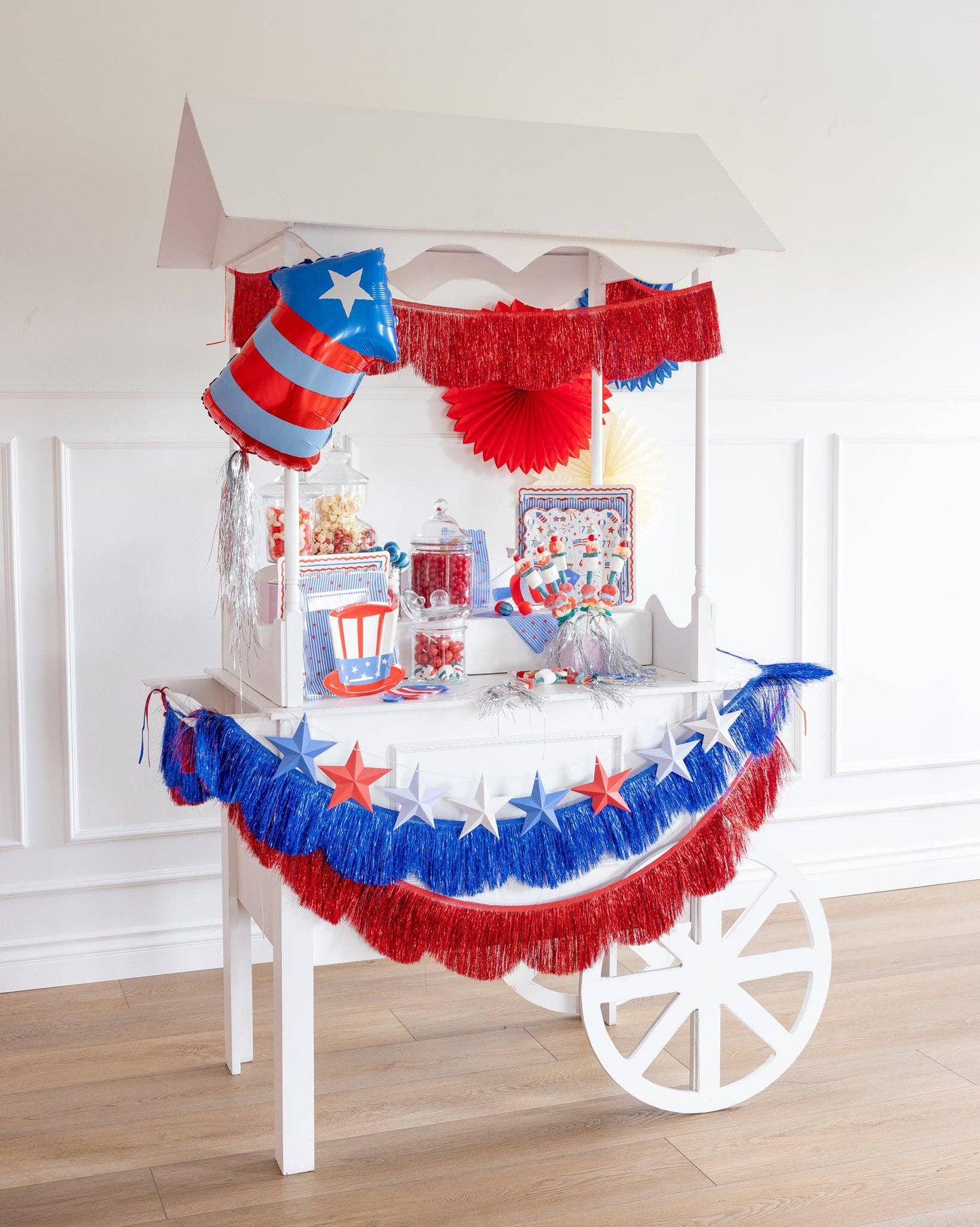 Colorful fringed scallop banner set by My Mind’s Eye featuring vibrant paper banners for party decoration.