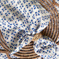 Set of 4 Royal Blue Petals Napkins by Christina Dickson Home, featuring elegant petal design and vibrant blue color.