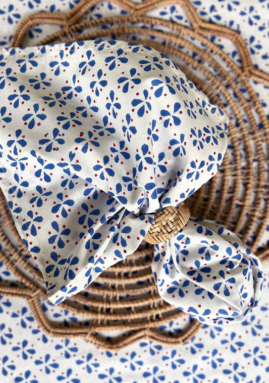 Set of 4 Royal Blue Petals Napkins by Christina Dickson Home, featuring elegant petal design and vibrant blue color.