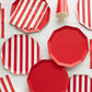 Cherry red Cabana Stripe guest towels by Bonjour Fête, showing soft fabric with bold stripe pattern and vibrant red color.