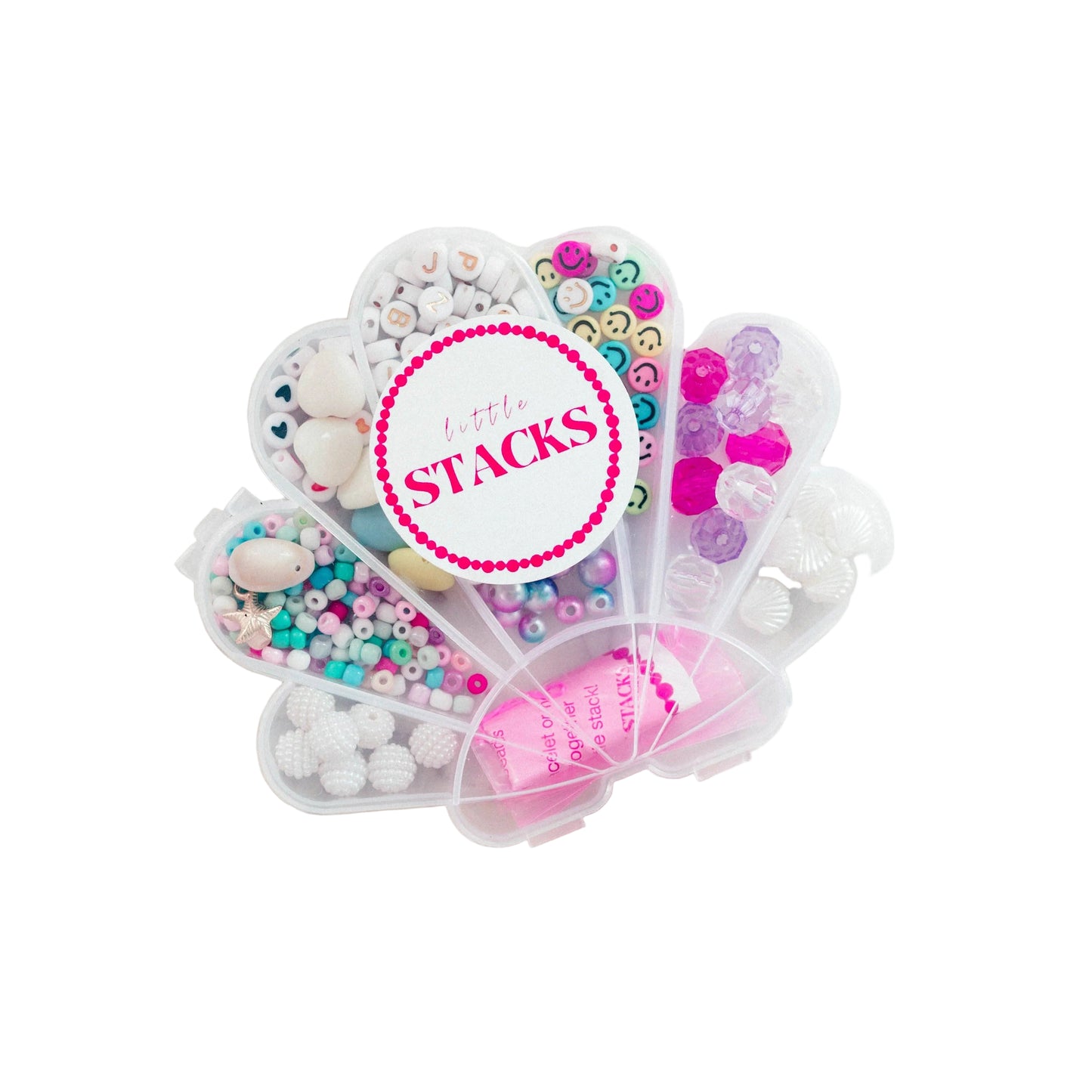 Colorful shell-shaped stacking toy from Little Stacks, featuring multiple vibrant shells for stacking and sensory play.