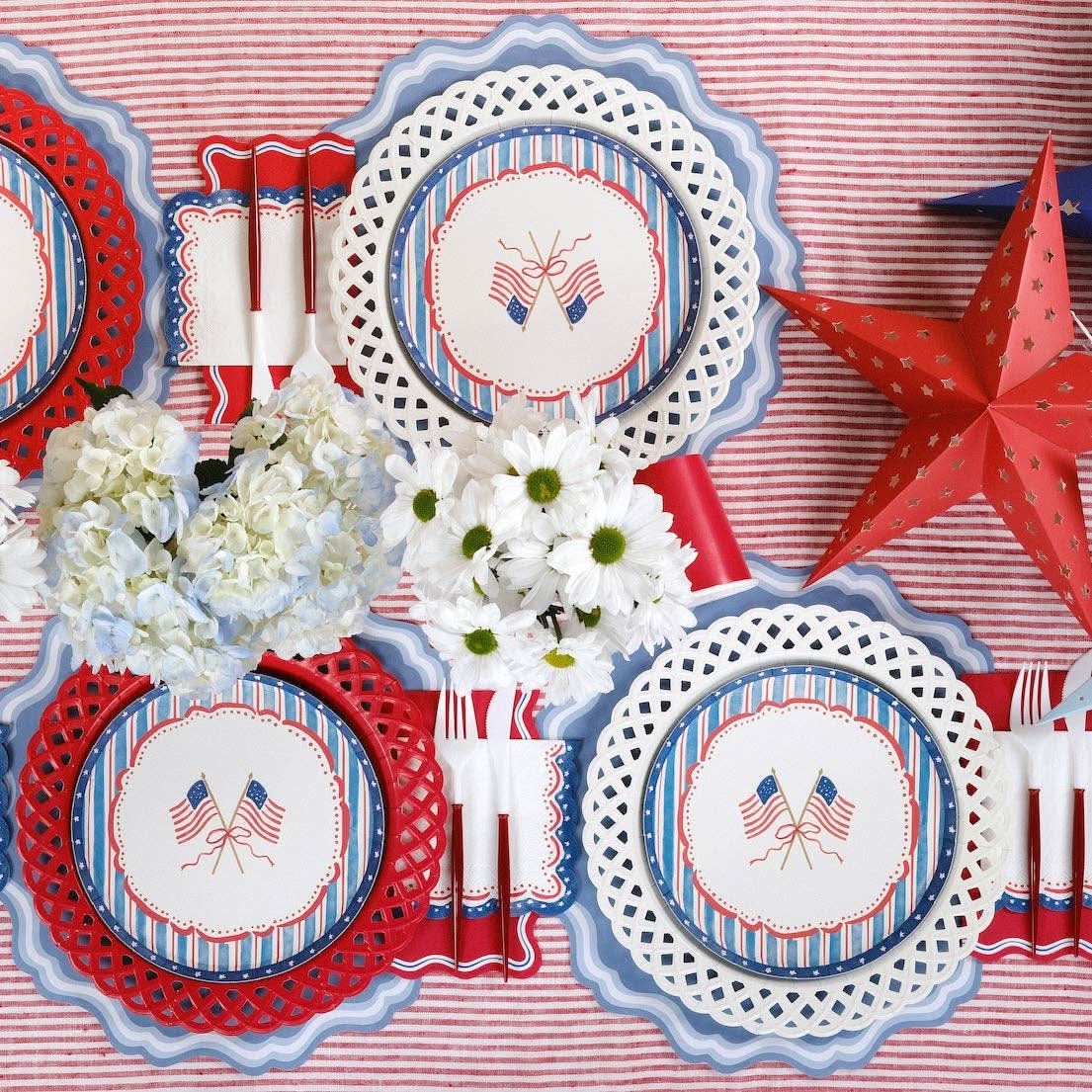Patriotic 4th of July cocktail napkin with red, white, and blue stars and stripes, from Gatherings by Curated Paperie.
