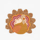 Thanksgiving turkey-shaped paper napkins with festive autumn leaves and turkey design for holiday table decor.