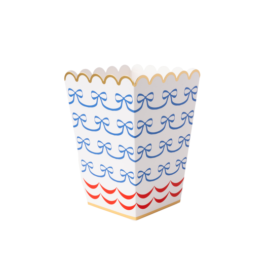 Bonjour Fête 4th of July bow flag popcorn boxes with patriotic red, white, and blue design and festive bow embellishments.