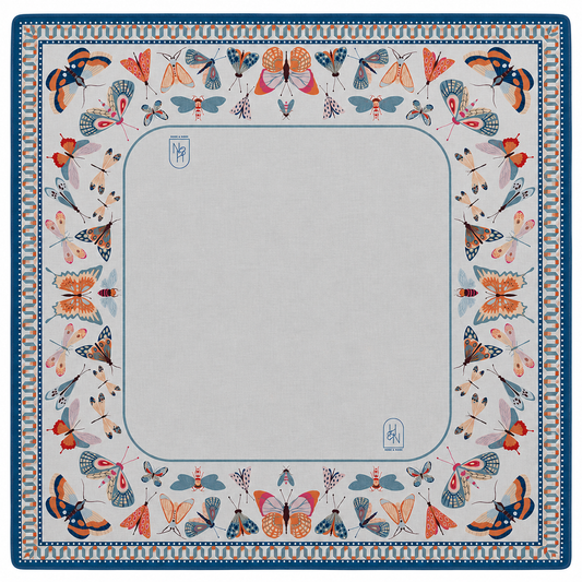 Mahjong mat featuring Winged Wonders design by Hutch and Nook, colorful fabric with intricate patterns for gameplay.