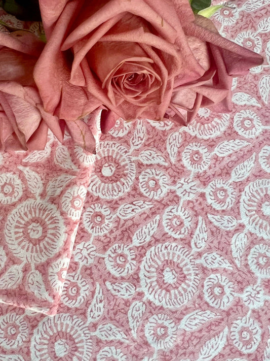 Feathered Tile Tablecloth in Dusty Rose by Christina Dickson Home, round 120-inch fabric with elegant feathered pattern.