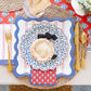 Red striped paper plate by My Mind’s Eye, 11-inch size, featuring bold red stripes on a white background for party or event use.