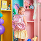 Pink Bows and Confetti Backpack by Packed Party with cheerful pink bows and colorful confetti pattern on a fabric backpack.