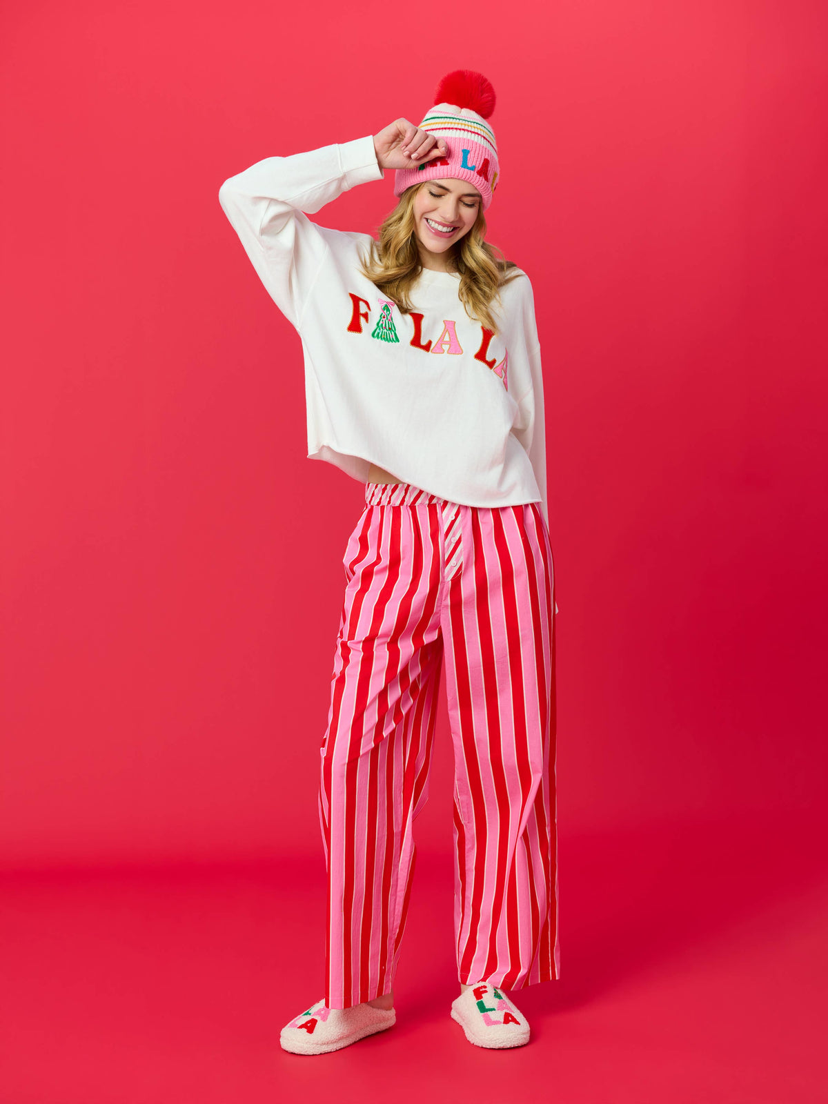 Shiraleah FA LA LA slippers in size S/M with festive red and white holiday pattern, cozy and soft slip-on footwear.
