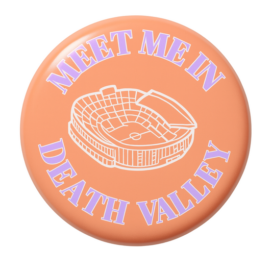 Button with 'Meet Me in Death Valley' text and stadium illustration on a peach background