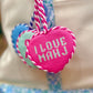 Southern Decorative I Love Mahj needlepoint bag charm featuring colorful embroidery and a decorative keyring attachment.