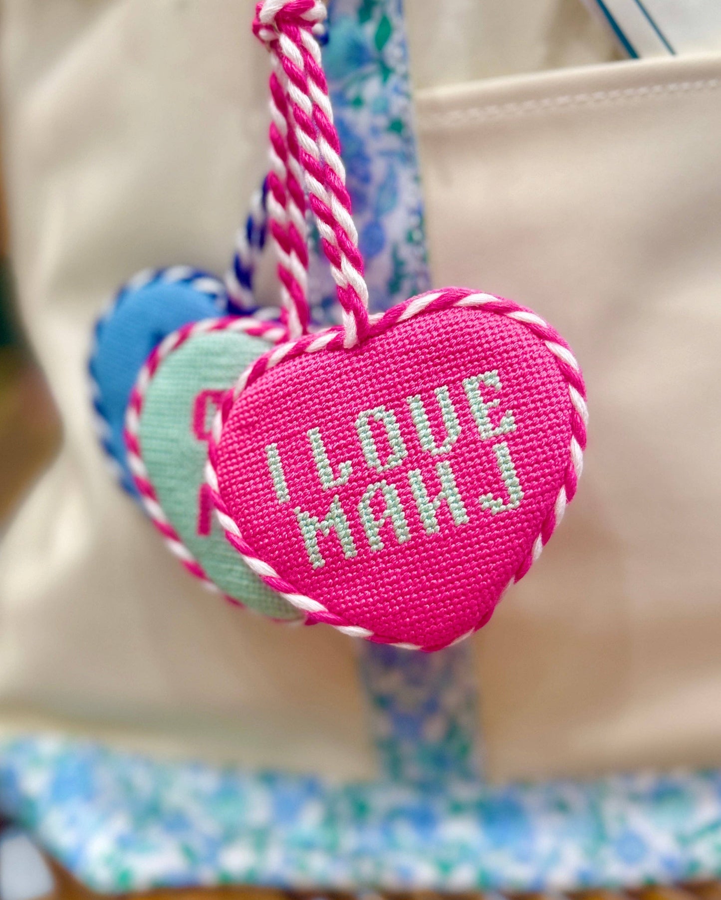 Southern Decorative I Love Mahj needlepoint bag charm featuring colorful embroidery and a decorative keyring attachment.