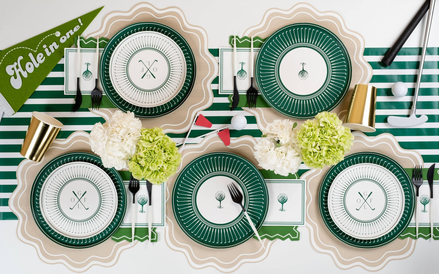 Set of 16 golf-themed beverage napkins with printed golf ball and club design from Gatherings by Curated Paperie.