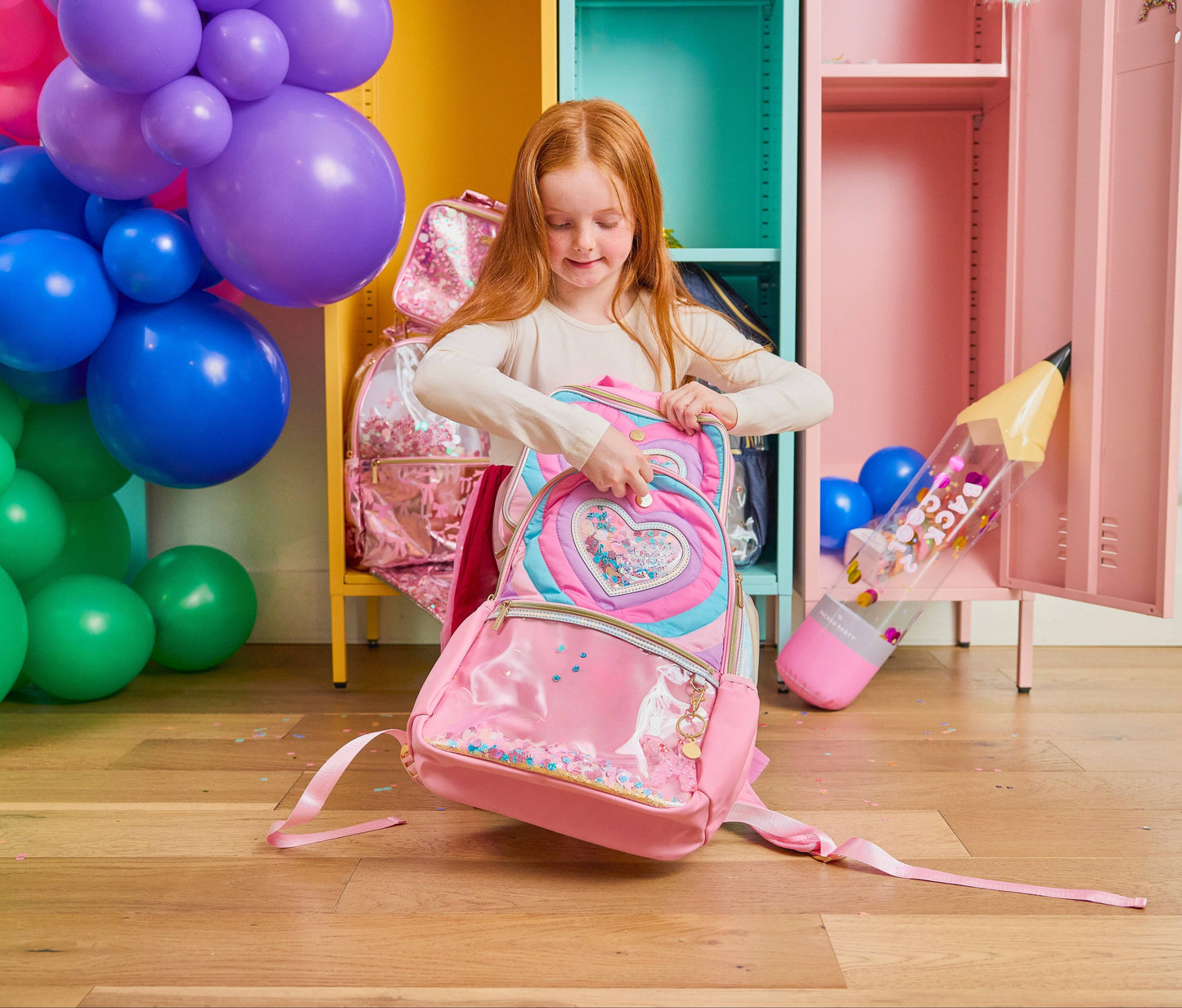 Taylor Quilted Confetti Hearts insulated lunchbox by Packed Party, featuring colorful heart patterns and quilted fabric design.