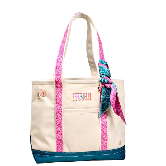 The Darling Canvas Tote Bag with "It's Mahj Time" print by The Darling Effect, featuring a sturdy beige canvas with black handles.