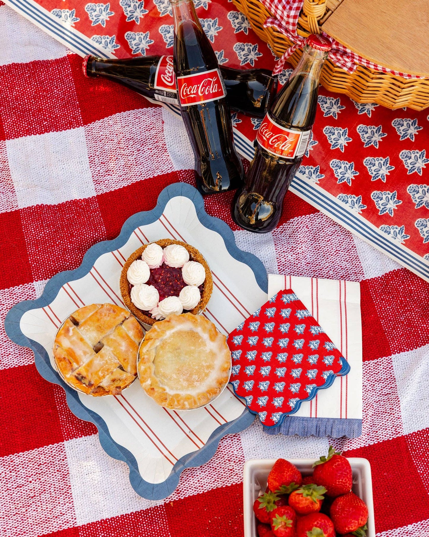 My Mind’s Eye plaid stars paper cocktail napkin with a colorful star and plaid pattern, ideal for party or celebration use.