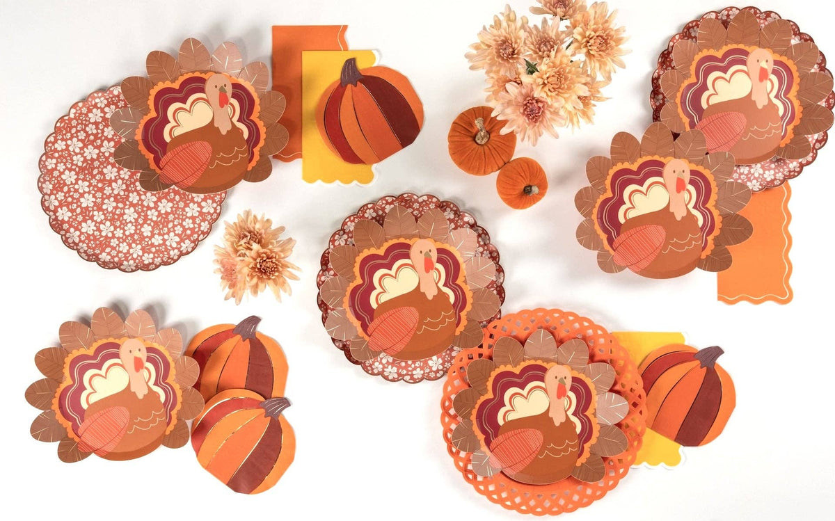 Set of Thanksgiving turkey-shaped plates by Gatherings by Curated Paperie, featuring festive turkey designs for holiday gatherings.