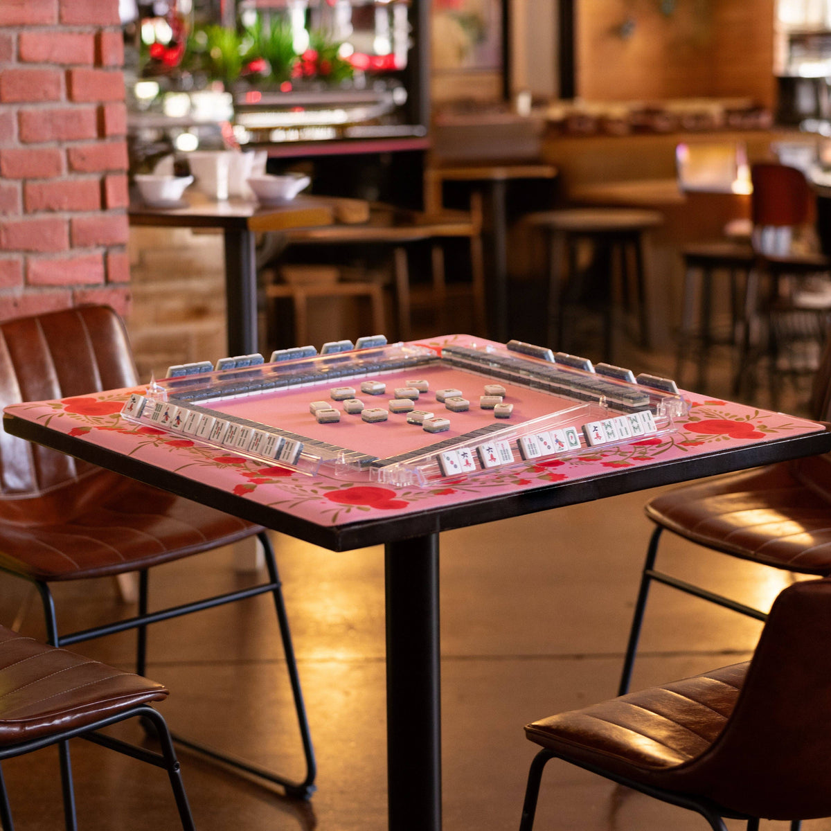 Pink rose Mahjong mat from Hutch and Nook featuring vibrant floral design and soft, cushioned surface for comfortable gameplay.