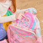 Taylor Quilted Hearts Confetti Pencil Pouch by Packed Party, pink quilted fabric with heart confetti pattern, zipper closure.