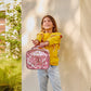 Pink Bows and Confetti Lunchbox by Packed Party, featuring a colorful design with bows and confetti patterns on a pink background.