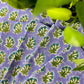 Set of 4 Christina Dickson Home Triple Flower in Lilac napkins with floral pattern for table decor and elegant dining.
