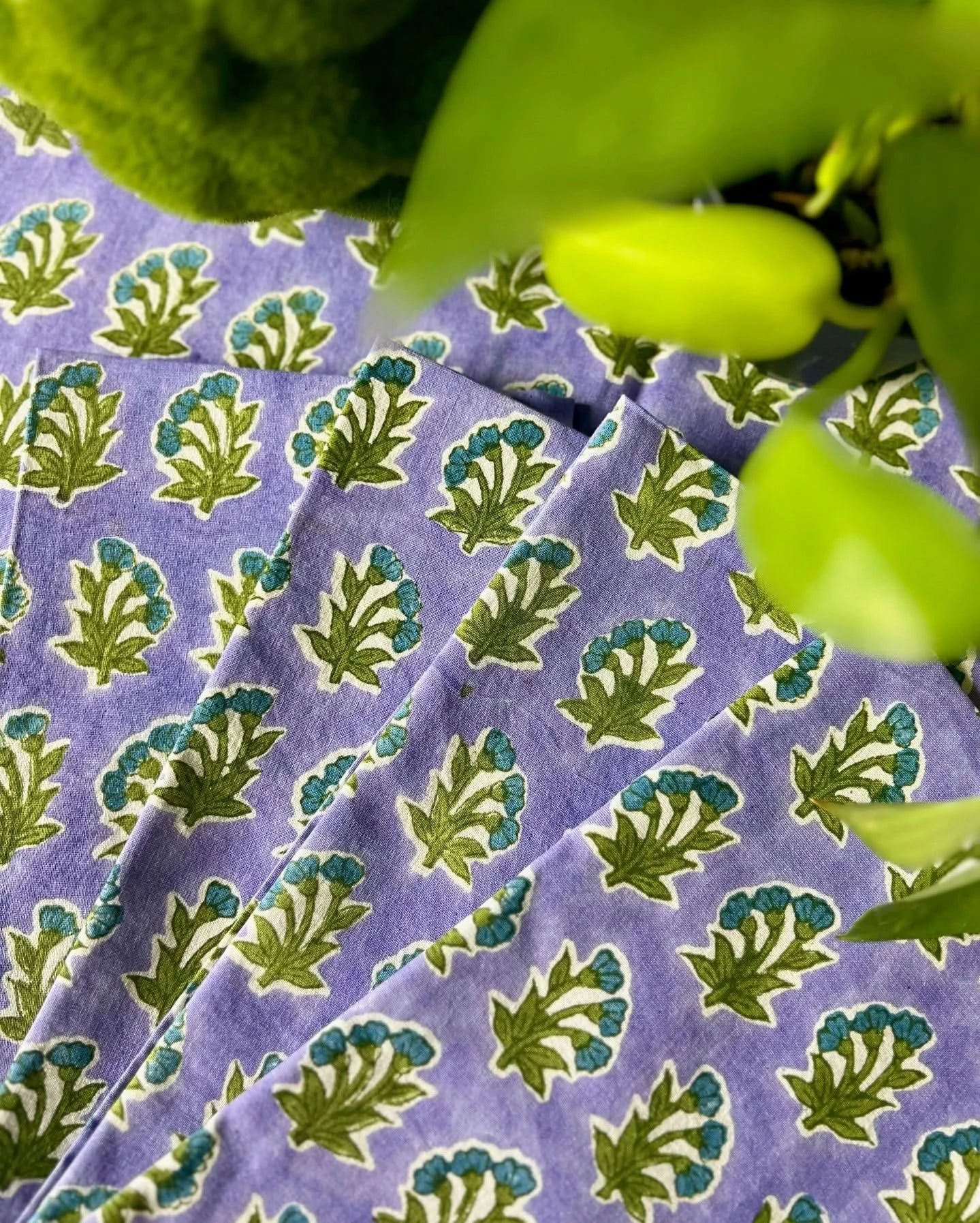 Set of 4 Christina Dickson Home Triple Flower in Lilac napkins with floral pattern for table decor and elegant dining.