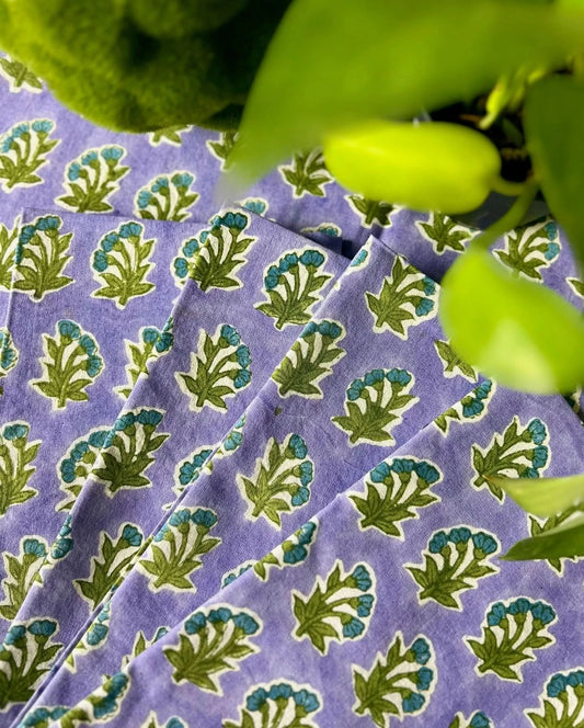 Set of 4 Christina Dickson Home Triple Flower in Lilac napkins with floral pattern for table decor and elegant dining.