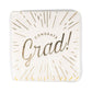 Foiled Congrats Grad cocktail napkin by My Mind’s Eye featuring a celebratory design with gold accents and "Congrats Grad" text.