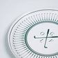 Set of 8 Gatherings by Curated Paperie 8.5-inch golf-themed dessert plates with vibrant golf ball and flag designs.